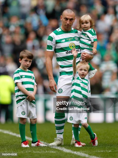 Scott Brown of Celtic is seen with his children during the Scott Brown testimonial match between Celtic and Republic of Ireland XI at Celtic Park on...