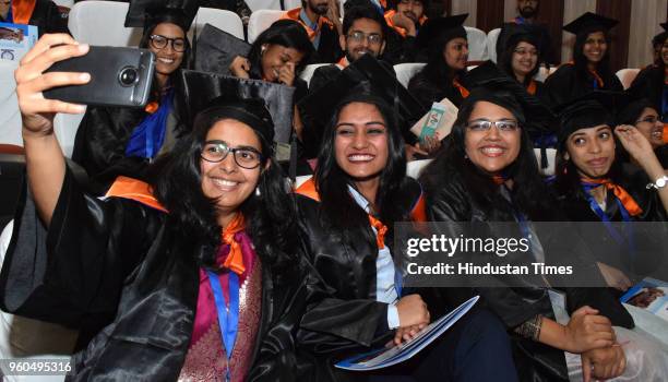 Students in a jubilant mood after receiving degrees during the 7th convocation of Indian Institute of Science Education and Research , on May 20,...