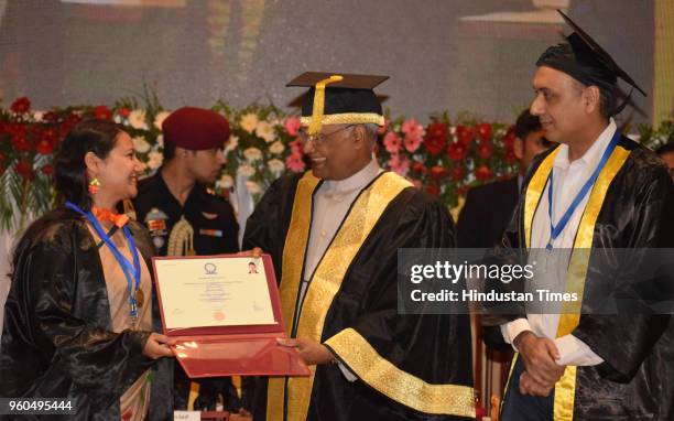 President Ram Nath Kovind presents certificate of Academic Excellence to Divya Gupta during the 7th convocation of Indian Institute of Science...