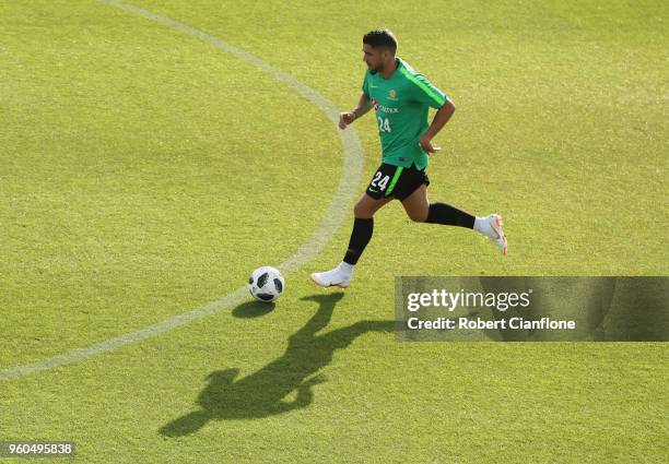 Dimitri Petratos of Australia runs with the ball during the Australian Socceroos Training Session at the Gloria Football Club on May 20, 2018 in...