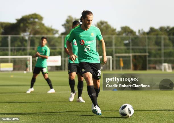 Joshua Brillante of Australia runs with the ball during the Australian Socceroos Training Session at the Gloria Football Club on May 20, 2018 in...