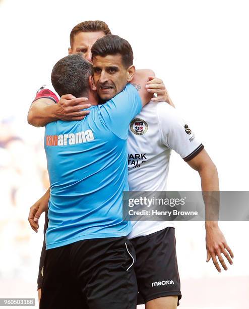 Omar Bugiel of Bromley celebrates with team mates after scoring their first goal during The Builbase FA Trophy Final between Brackley Town and...