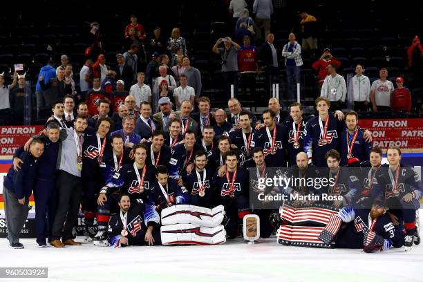 The team of the United States celebrate winning the bronze medal after the 2018 IIHF Ice Hockey World Championship Bronze Medal Game game between the...