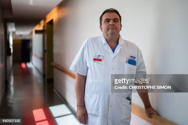 French surgeon Emmanuel Martinod poses at the Avicenne Hospital in Bobigny, east of Paris, on May 17, 2018. - Where others failed, sometimes...