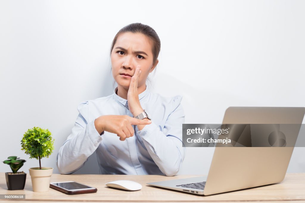 Woman gossip when she look at laptop