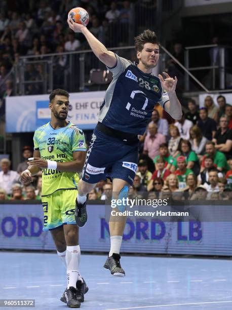 Adrien Dipanda of Saint-Raphael and Erik Schmidt of Fuechse Berlin vie during the Ottostadt Magdeburg EHF Cup Final Four 2018 first place playoff...