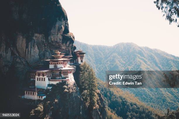 bhutan buildings early in the morning with mist - paro stock pictures, royalty-free photos & images