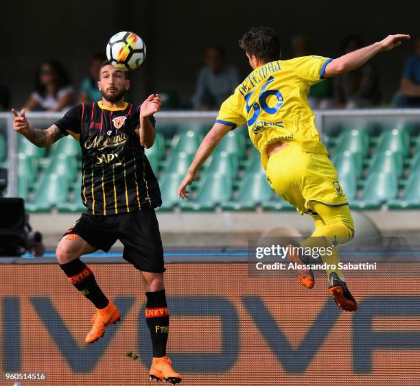 Danilo Cataldi of Benevento Calcio competes for the ball whit Perparim Hetemaj AC Chievo Verona during the serie A match between AC Chievo Verona and...