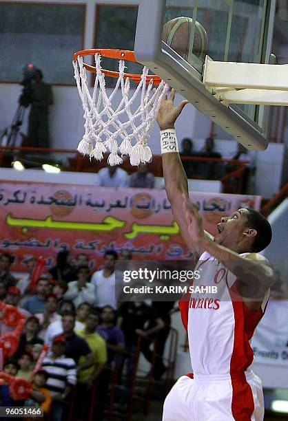 Giles of Lebanon's Al-Riyadi Sporting club heads for the basket during their Dubai International Basketball Tournament final match against Iran's...