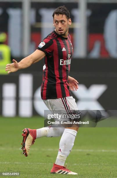 Hakan Calhanoglu of AC Milan celebrates his goal during the serie A match between AC Milan and ACF Fiorentina at Stadio Giuseppe Meazza on May 20,...