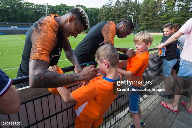 Patrick van Aanholt of Holland, Terence Kongolo of Holland with supporters during the Training Holland at the KNVB Campus on May 20, 2018 in Zeist...