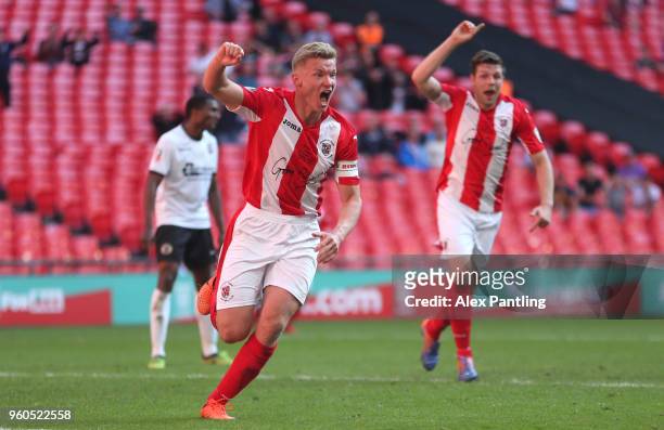 Gareth Dean of Brackley Town celebrates after he scores his sides first goal during the Buildbase FA Trophy Final between Brackley Town and Bromley...