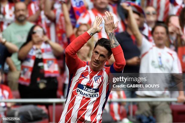 Atletico Madrid's Spanish forward Fernando Torres celebrates after scoring a goal during the Spanish league football match between Club Atletico de...