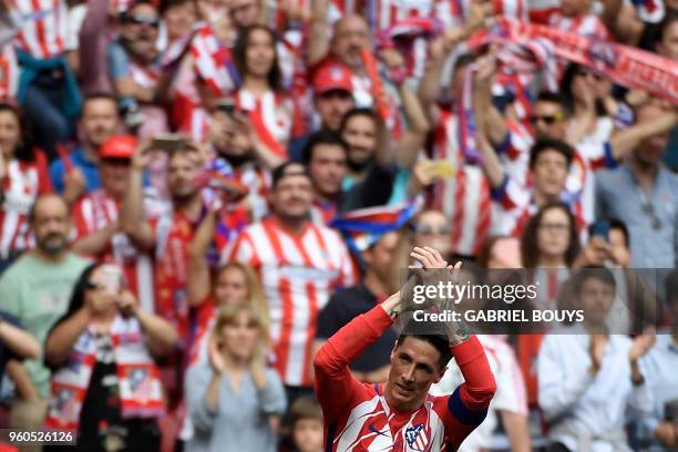 Atletico Madrid's Spanish forward Fernando Torres celebrates after scoring a goal during the Spanish league football match between Club Atletico de...