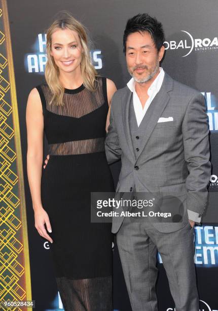 Actor Kenneth Choi and guest arrive for the Global Road Entertainment's "Hotel Artemis" Premiere held at Regency Village Theatre on May 19, 2018 in...