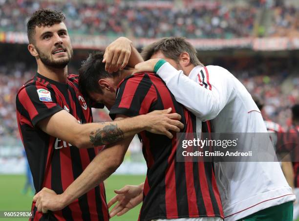 Nikola Kalinic of AC Milan celebrates his goal with his team-mate Patrick Cutrone during the serie A match between AC Milan and ACF Fiorentina at...