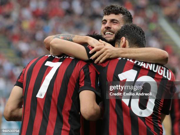 Nikola Kalinic of AC Milan celebrates his goal with his team-mates Patrick Cutrone and Hakan Calhanoglu during the Serie A match between AC Milan and...