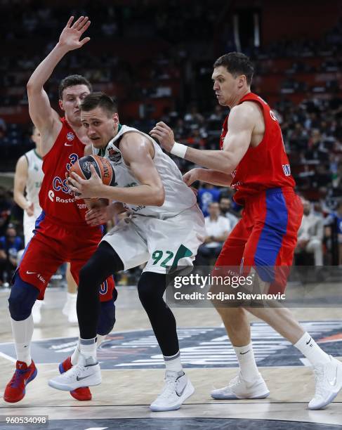 Edgaras Ulanovas of Zalgiris is challenged by Mikhail Kulagin and Semen Antonov of CSKA during the Turkish Airlines Euroleague Final Four Belgrade...