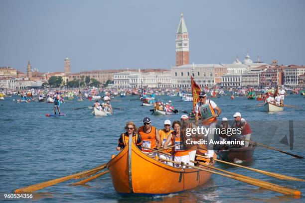 The participants row at the start of the Vogalonga, a non-competitive rowing marathon on May 20, 2018 in Venice, Italy. The 32 km course goes around...