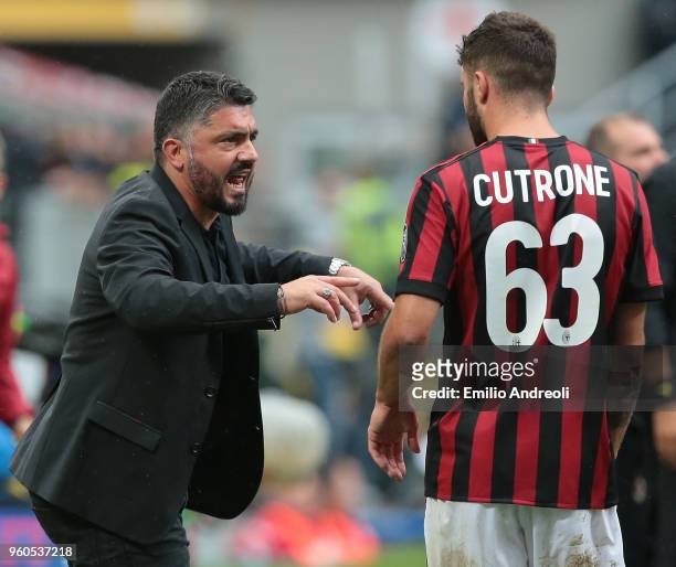 Milan coach Ivan Gennaro Gattuso speaks with Patrick Cutrone during the serie A match between AC Milan and ACF Fiorentina at Stadio Giuseppe Meazza...