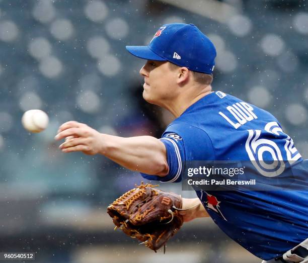 Pitcher Aaron Loup of the Toronto Blue Jays pitches during a interleague MLB baseball game against the New York Mets on May 16, 2018 at CitiField in...