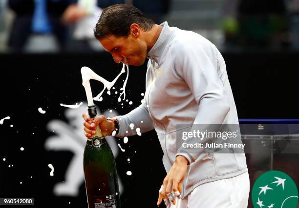 Rafael Nadal of Spain celebrates with champagne after defeating Alexander Zverev of Germany in the final during day eight of the Internazionali BNL...