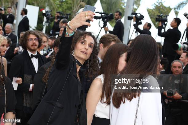 Guest doing the "prohibited" selfie on the red carpet attends the screening of "The Wild Pear Tree " during the 71st annual Cannes Film Festival at...