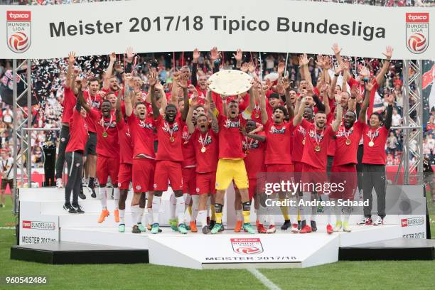 Salzburg's captain Alexander Walke celebrates with the trophy for winning the Austrian Soccer Championship after the tipico Bundesliga match between...
