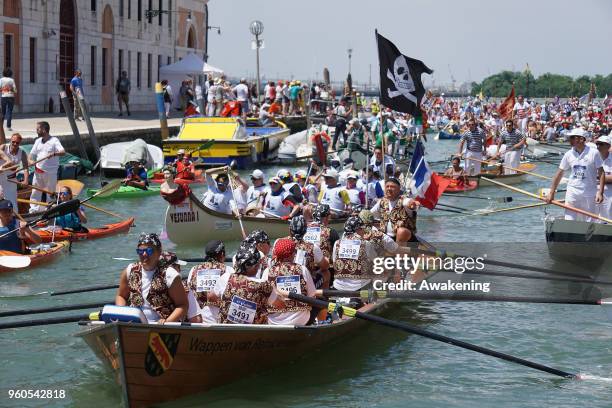 The Vogalonga participants pass through the Canale of Cannaregio on May 20, 2018 in Venice, Italy. The 32 km cuorse goes around the lagoon and...