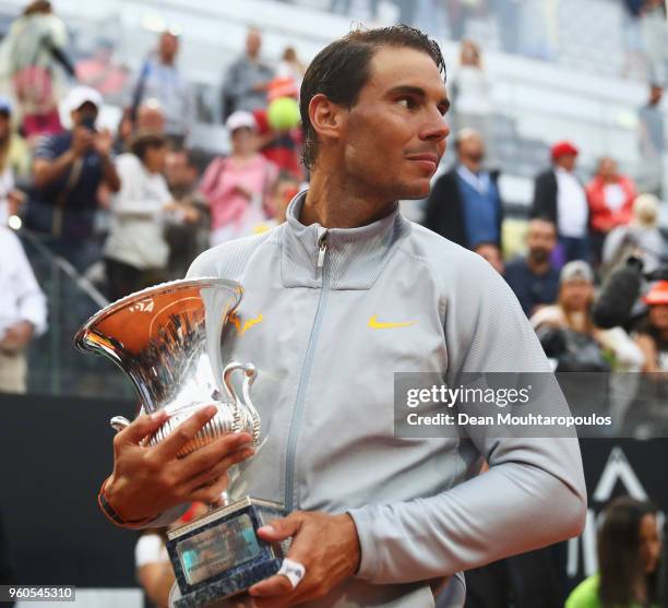 Rafael Nadal of Spain celebrates with the trophy after victory in his Mens Final match against Alexander Zverev of Germany during day 8 of the...