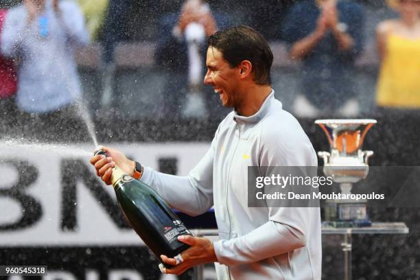 Rafael Nadal of Spain celebrates with the trophy after victory in his Mens Final match against Alexander Zverev of Germany during day 8 of the...