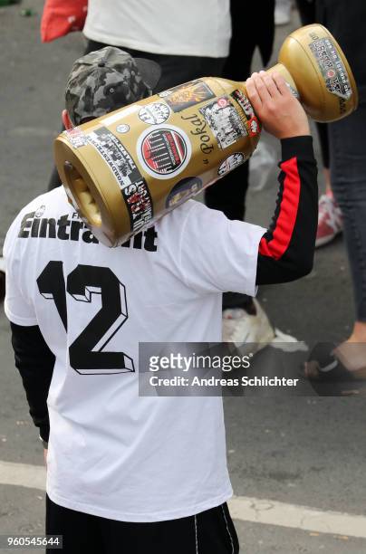 Fan of Eintracht Frankfurt celebrates winning the DFB Cup at Mainufer on May 20, 2018 in Frankfurt am Main, Germany.