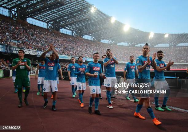 Napoli's players greet fans at the end of the Italian Serie A football match SSC Napoli vs FC Crotone on May 20, 2018 at the San Paolo Stadium.