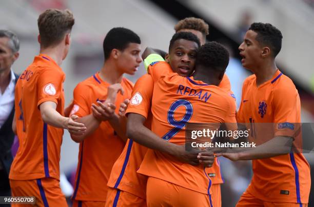 Jurrien Maduro of the Netherlands celebrates after scoring his sides first goal with his team mates during the UEFA European Under-17 Championship...