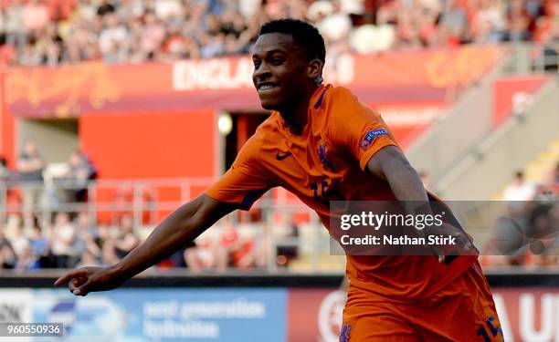 Jurrien Maduro of the Netherlands celebrates after scoring his sides first goal during the UEFA European Under-17 Championship Final between Italy...