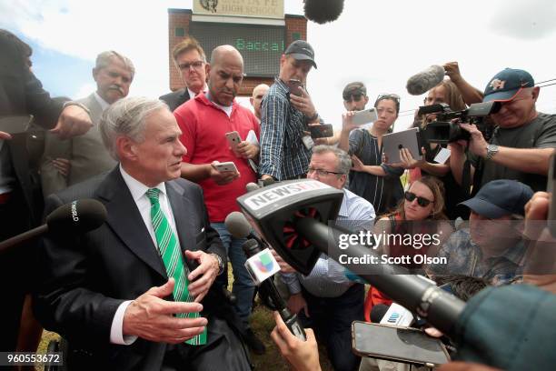 Texas Governor Greg Abbott speaks to the press during a visit to Santa Fe High School on May 20, 2018 in Santa Fe, Texas. Last Friday, 17-year-old...