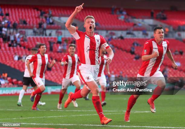 Gareth Dean of Brackley Town celebrates after he scores his sides first goal during the Buildbase FA Trophy Final between Brackley Town and Bromley...