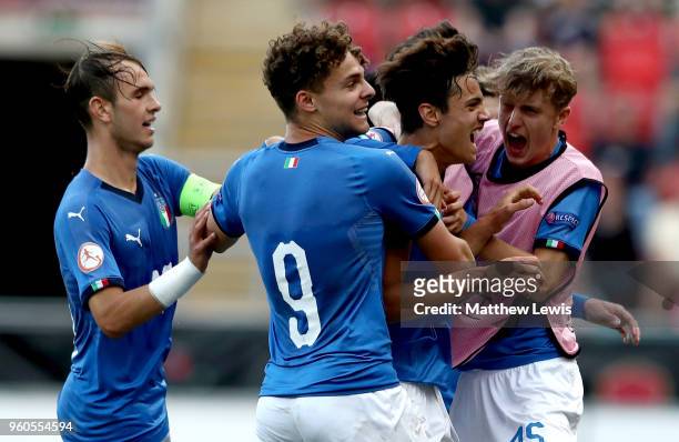 Samuele Ricci of Italy celebrates after scoring his sides first goal with his team mates during the UEFA European Under-17 Championship Final between...