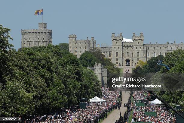 Prince Harry, Duke of Sussex and Meghan, Duchess of Sussex head up The Long Walk back into Windsor Castle in the Ascot Landau carriage during the...