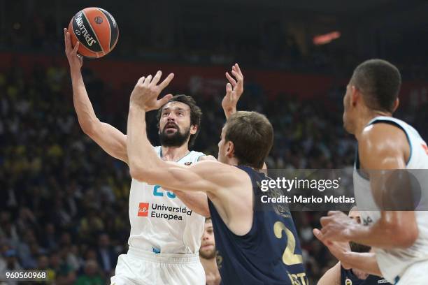 Sergio Llull, #23 of Real Madrid competes with Jan Vesely, #24 of Fenerbahce Dogus Istanbul during the 2018 Turkish Airlines EuroLeague F4 Third...