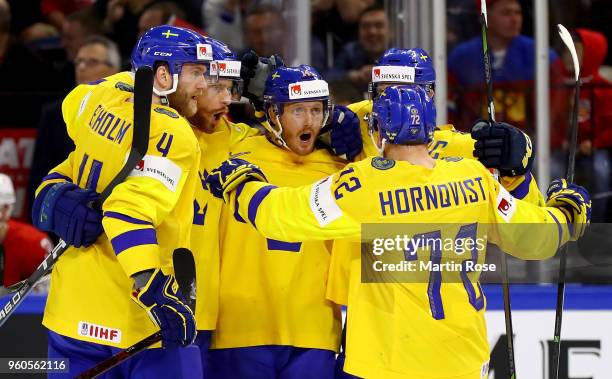 Gustav Nyquist of Sweden celebrate with his team mates after he scores the equalizing goal during the 2018 IIHF Ice Hockey World Championship Gold...