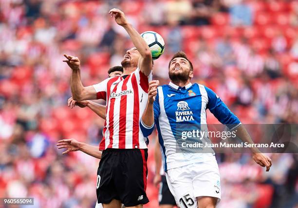 Aritz Aduriz of Athletic Club competes for the ball with David Lopez of RCD Espanyol during the La Liga match between Athletic Club and RCD Espanyol...