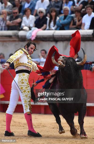 Spanish matador Juan Jose Padilla performs a muleta pass on a Nunez Del Cuvillo fighting bull on May 20, 2018 during the Nimes Pentecost Feria,...
