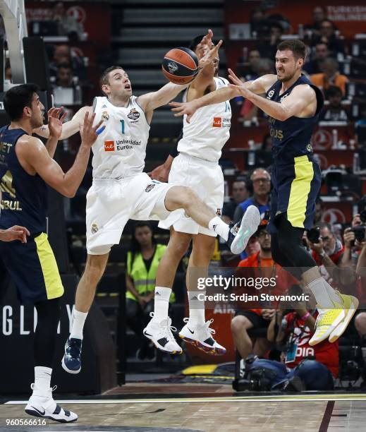 Marko Guduric of Fenerbahce in action against Gustavo Ayon and Fabien Causeur of Real Madrid during the Turkish Airlines Euroleague Final Four...