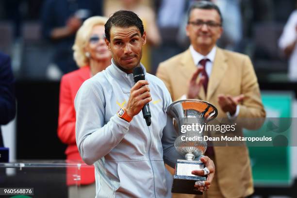 Rafael Nadal of Spain celebrates with the trophy after victory in his Mens Final match against Alexander Zverev of Germany during day 8 of the...