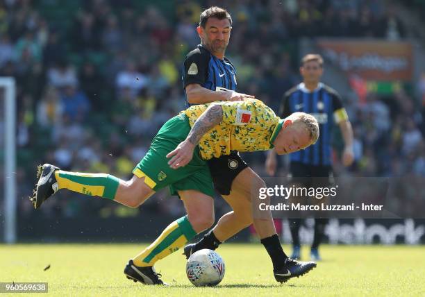 Giorgios Karagounis of Inter Forever competes for the ball with Gary Holt of Norwich City FC Legends during Norwich Legends v Inter Forever at Carrow...