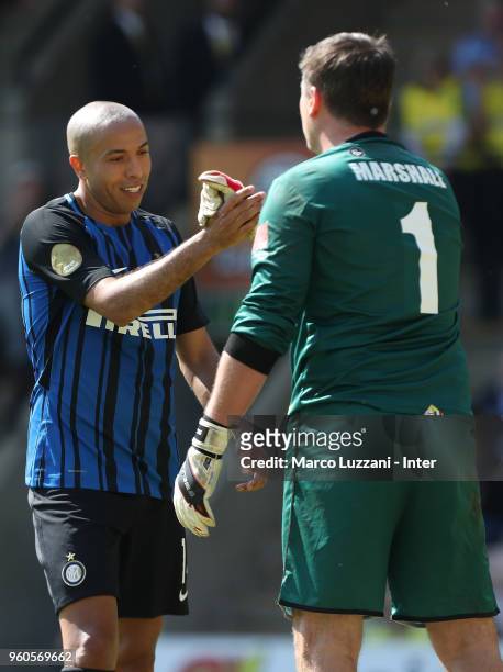 Houssine Kharja of Inter Forever shakes hands with Andy Marshall of Norwich City FC Legends during Norwich Legends v Inter Forever at Carrow Road on...