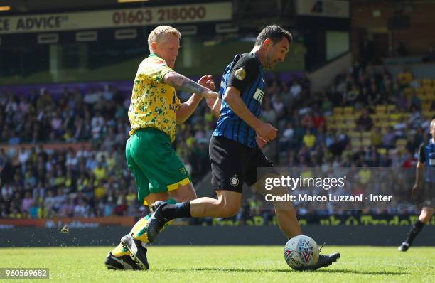 Giorgios Karagounis of Inter Forever competes for the ball with Gary Holt of Norwich City FC Legends during Norwich Legends v Inter Forever at Carrow...
