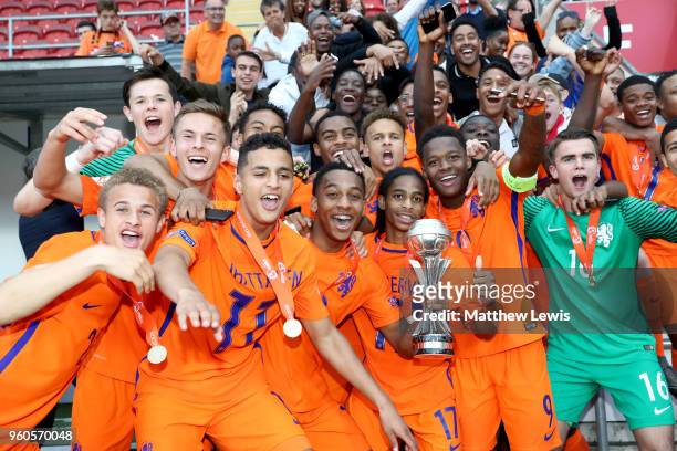 The Netherlands team celebrate with the trophy after the UEFA European Under-17 Championship Final between Italy and the Netherlands at New York...