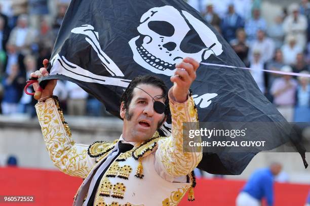 Spanish matador Juan Jose Padilla waves a pirate flag on May 20, 2018 during the Nimes Pentecost Feria, southern France.